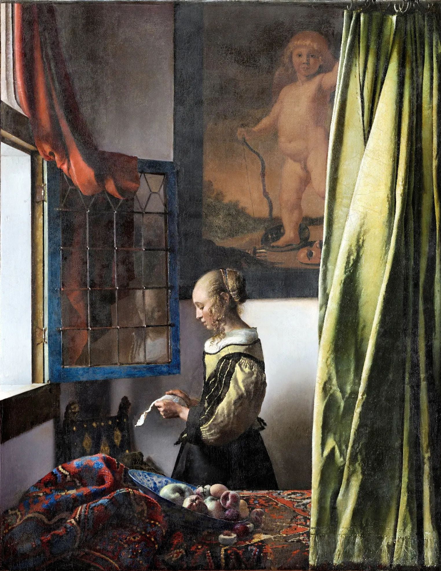 Girl Reading a Letter at an Open Window by Johannes Vermeer